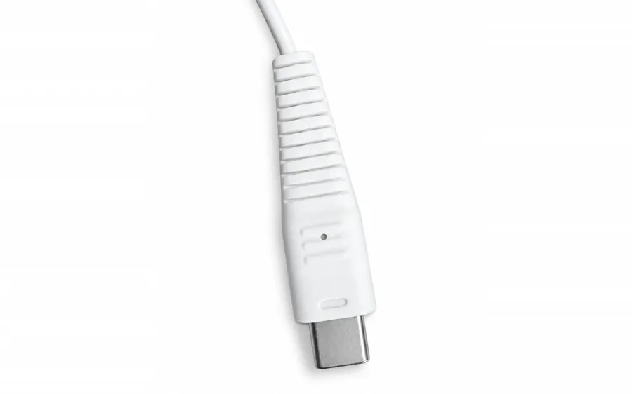 Close-up of the custom-shaped, ribbed USB-C security plug that connects SC09_AP to the S-Series alarm