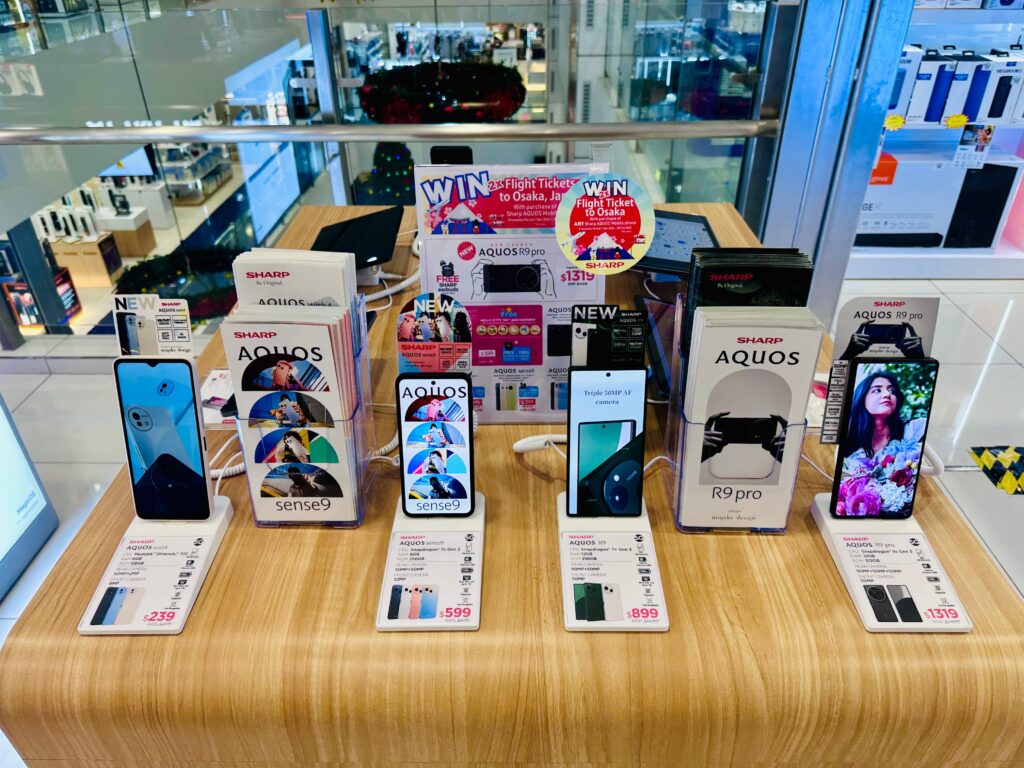 519db28b00eab6a775182cafd63245f9 the preferred choice of singapore's sharp aquos mobile marketing -price tag mobile phone security display stand